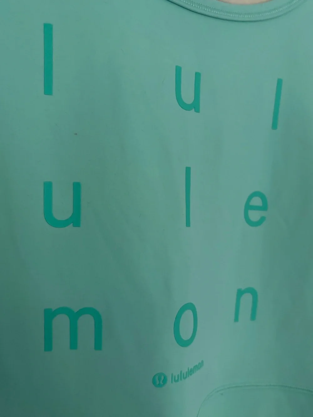 1. Size Large LULULEMON Seafoam Power Pivot Tank With Spellout