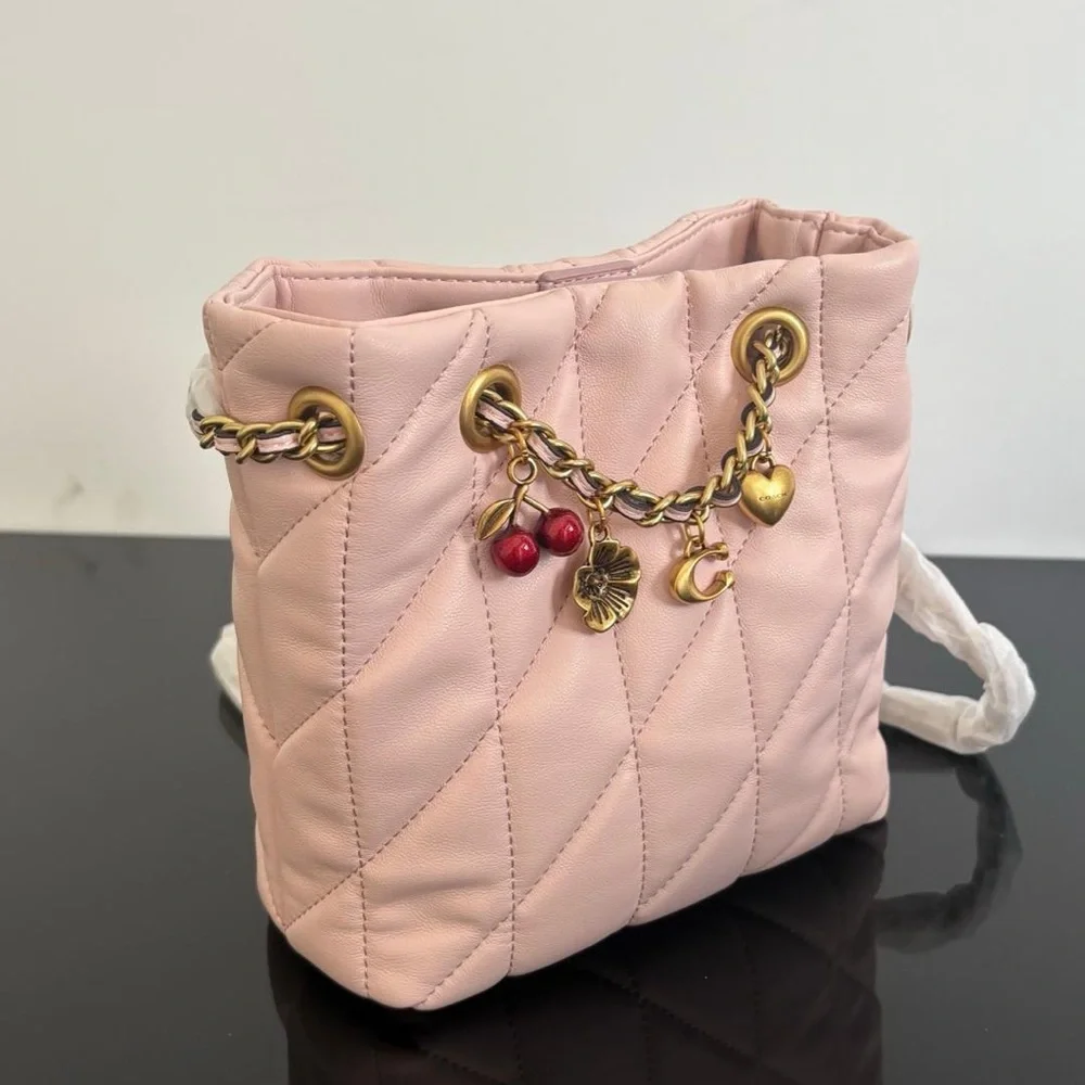 Coach soft pink