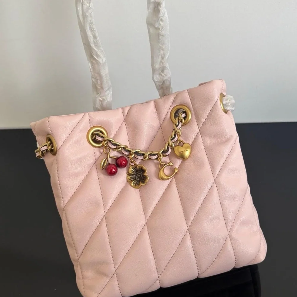 Coach soft pink
