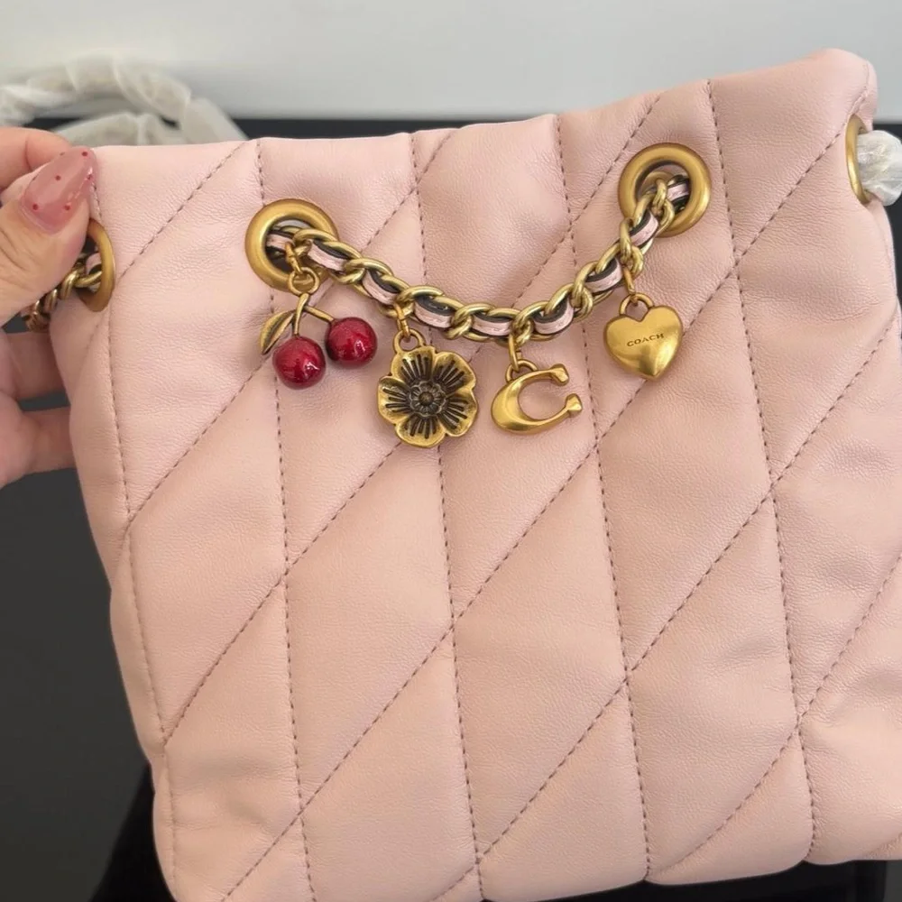 Coach soft pink