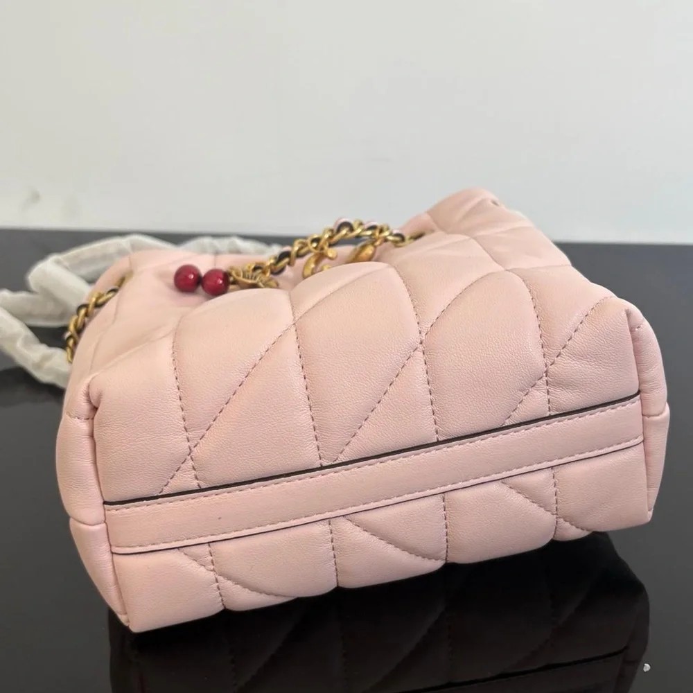 Coach soft pink