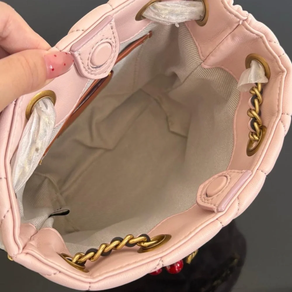 Coach soft pink
