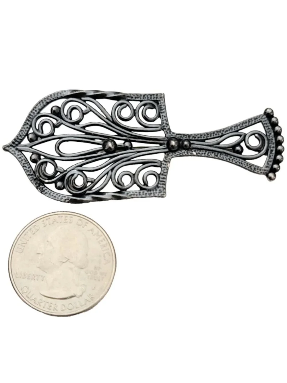 Napier spatula brooch