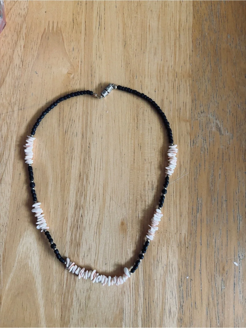 Vintage shipping white puka