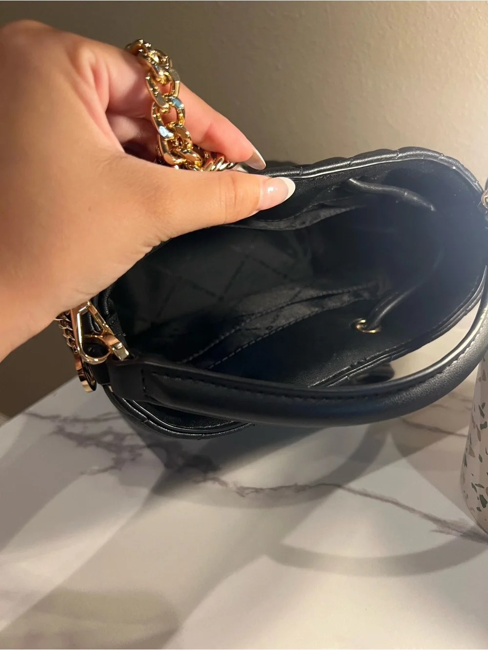 Michael Kors bucket strap use