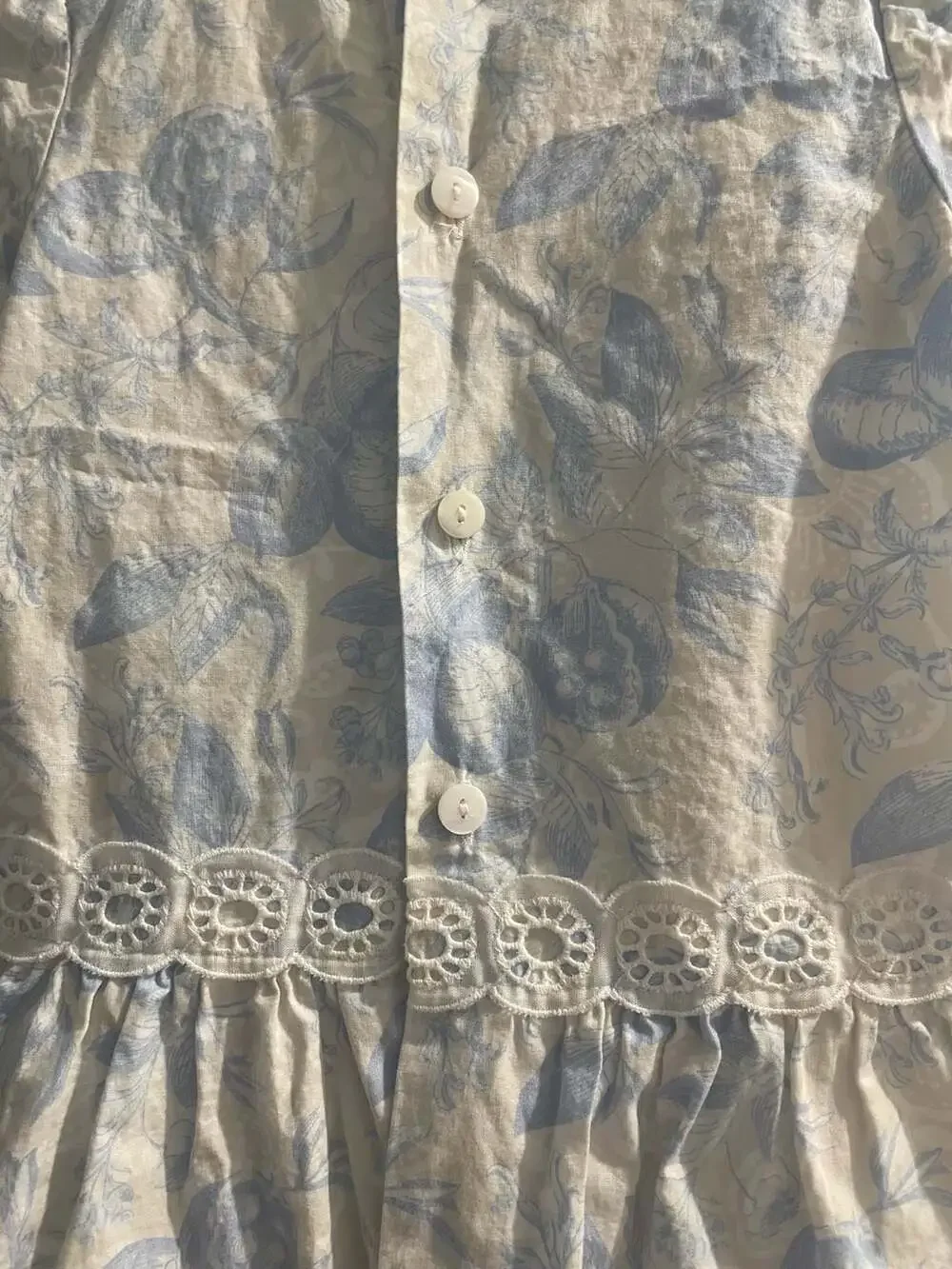 Cocote Tu Ropita Blue Floral Print Cotton Dress with Eyelet Trim and Bow Detail