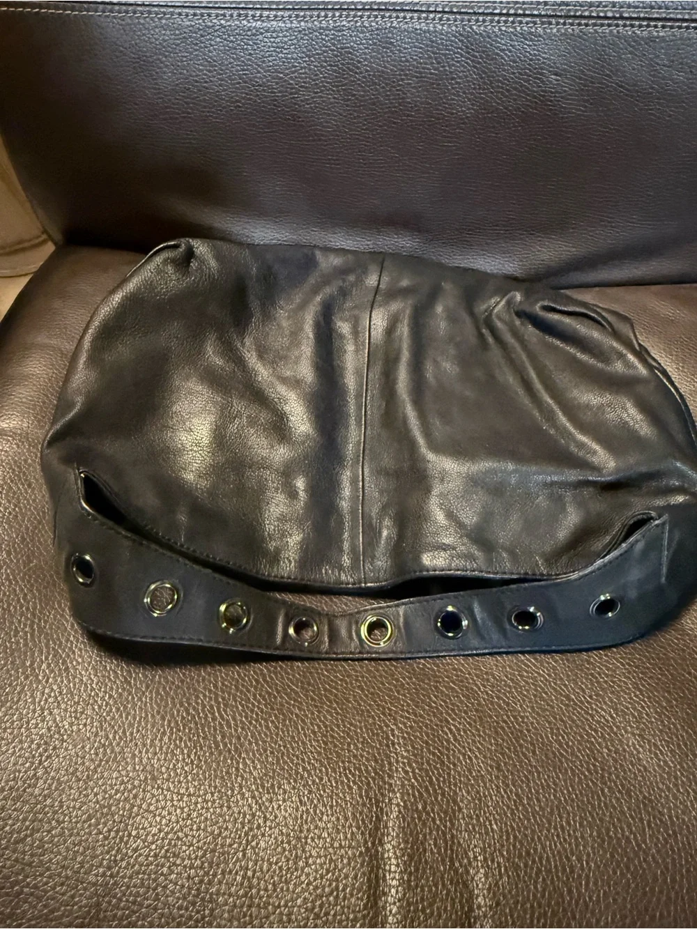 Kenneth Cole Reaction shoulder metal style