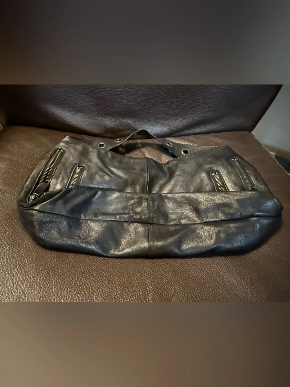 Kenneth Cole Reaction shoulder eyelet