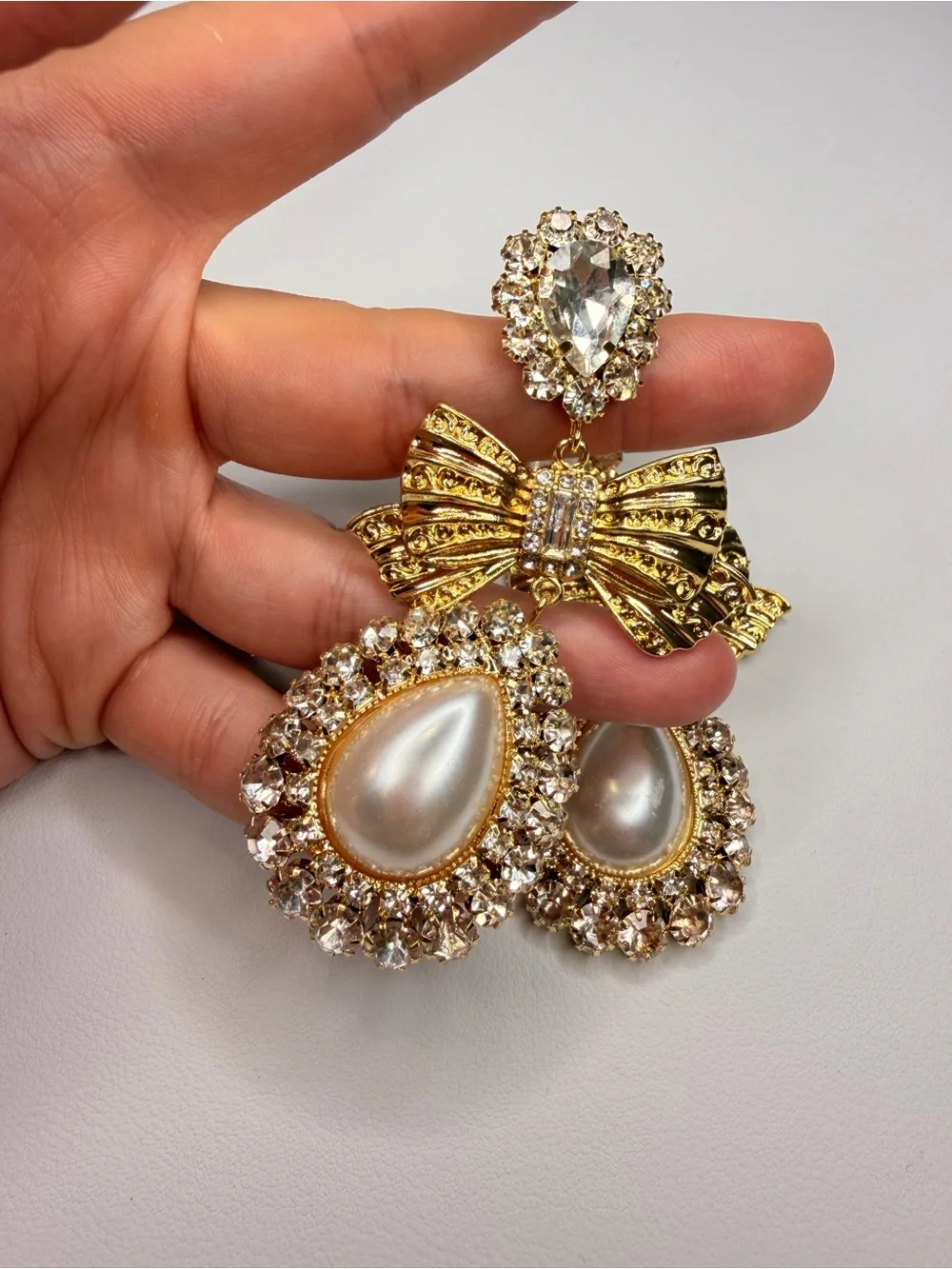 Gold Bow Pearl Drop Earrings with Clear Crystals