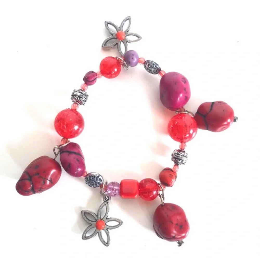 Handcrafted artisan red and burgundy stones paired with silver flowers bracelet