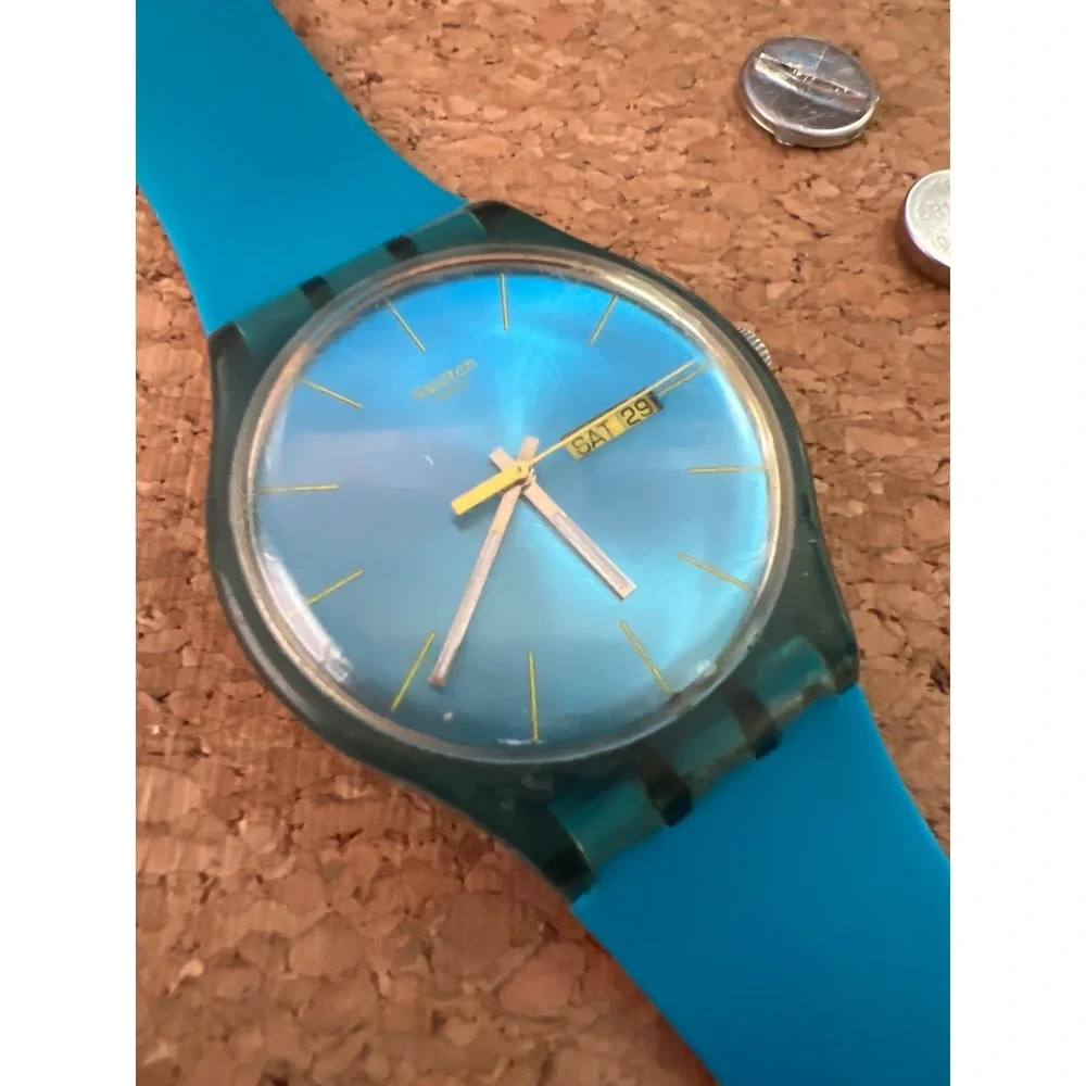 Swatch Blue Rebel SUON700 Day Date Blue Dial Silicone Strap Watch Vintage Swiss