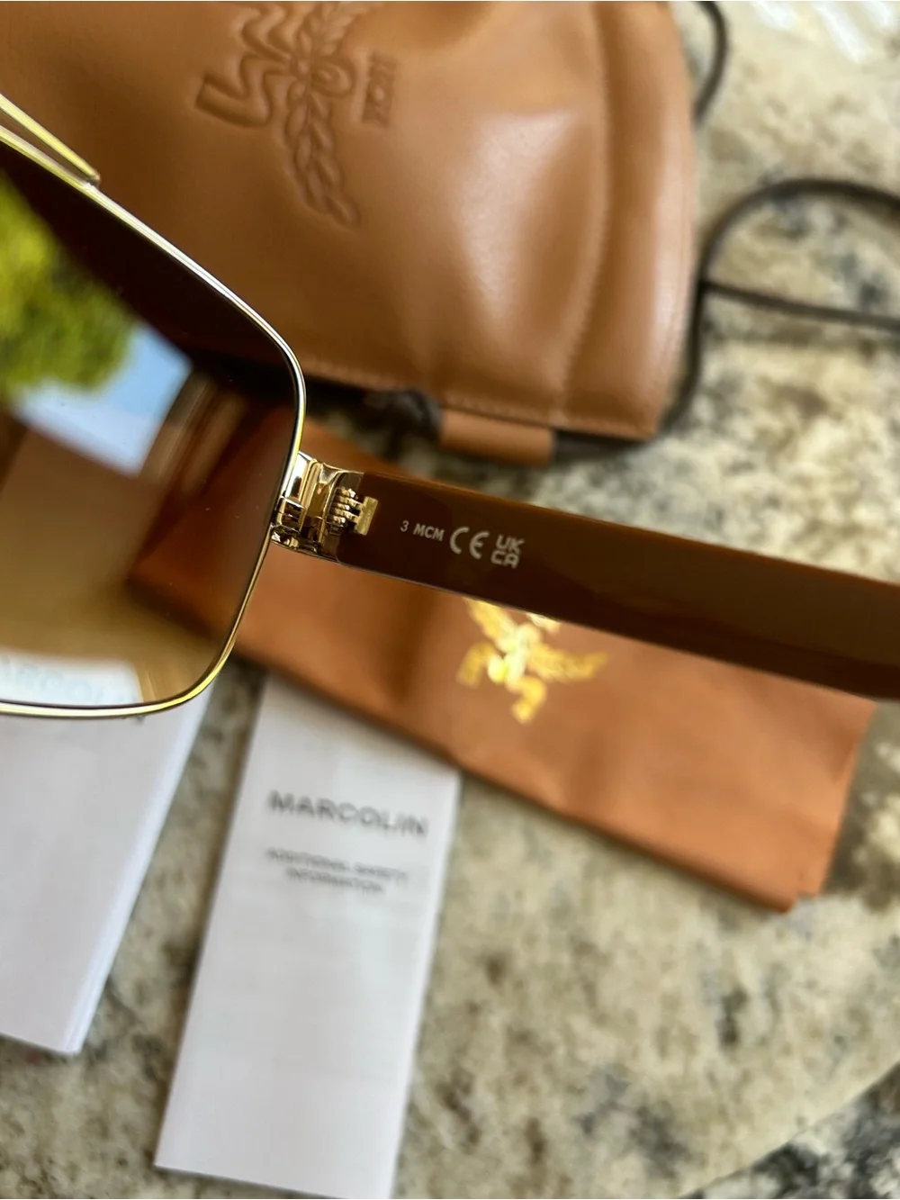 MCM sunglasses gold