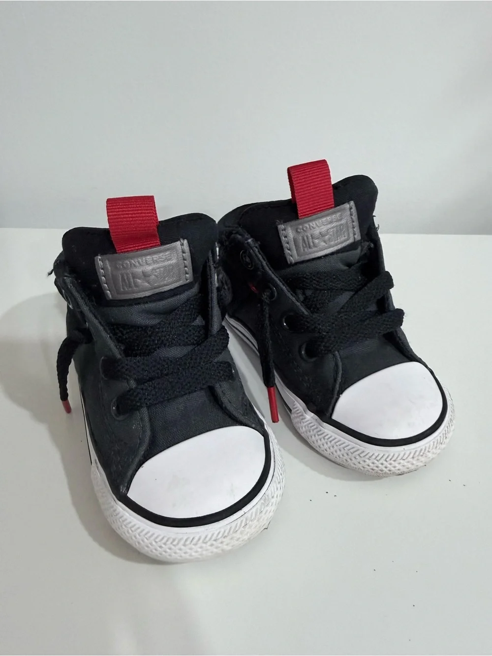 Converse Kids Black Canvas High-Top Sneakers with Red Pull Tabs