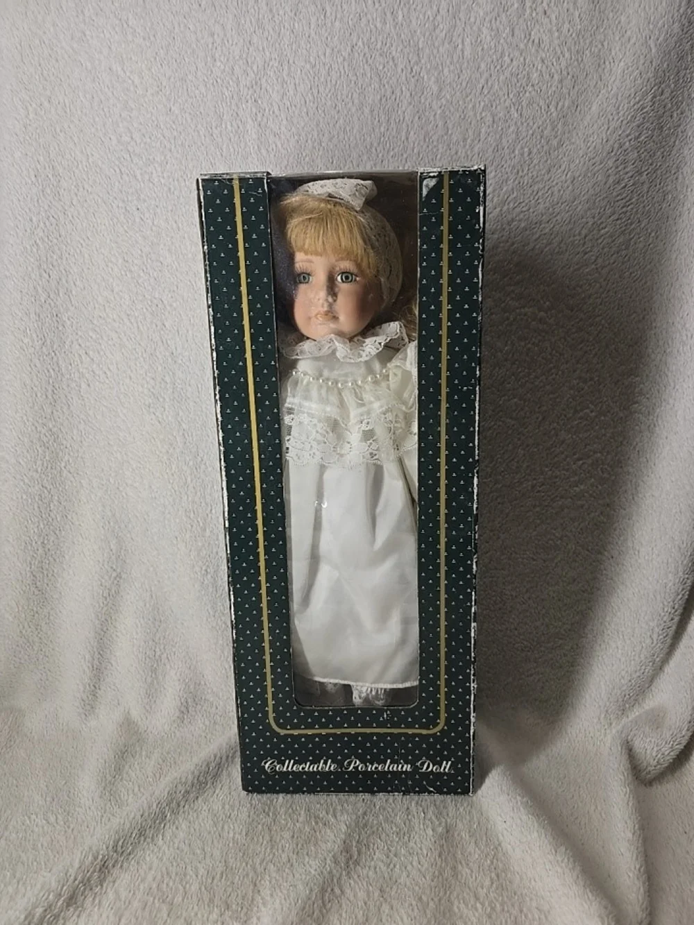 Source Unknown collar doll white