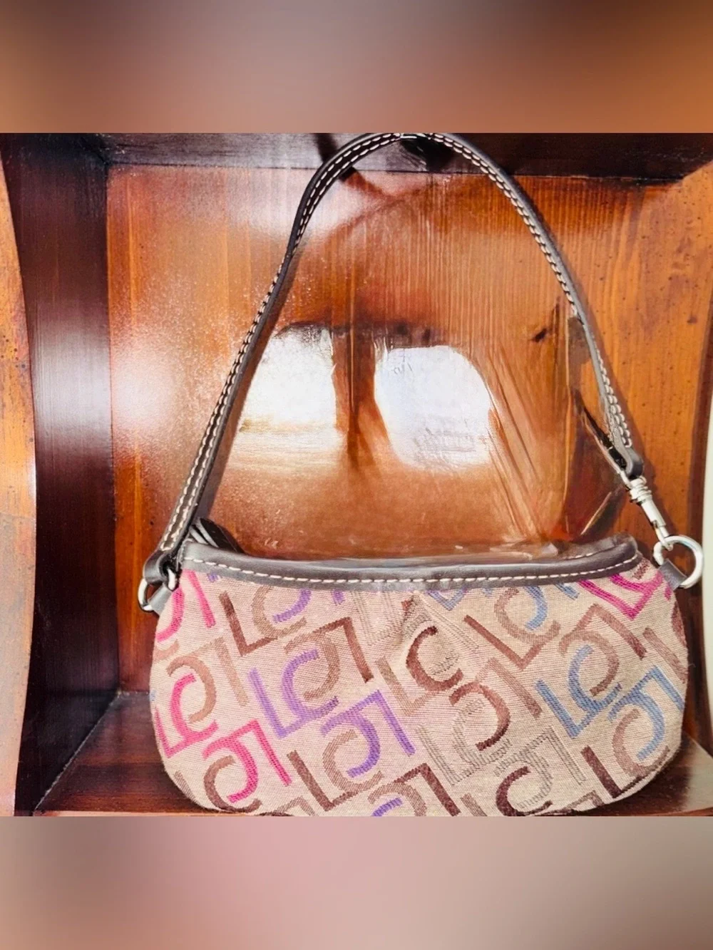 Liz Claiborne bag falls