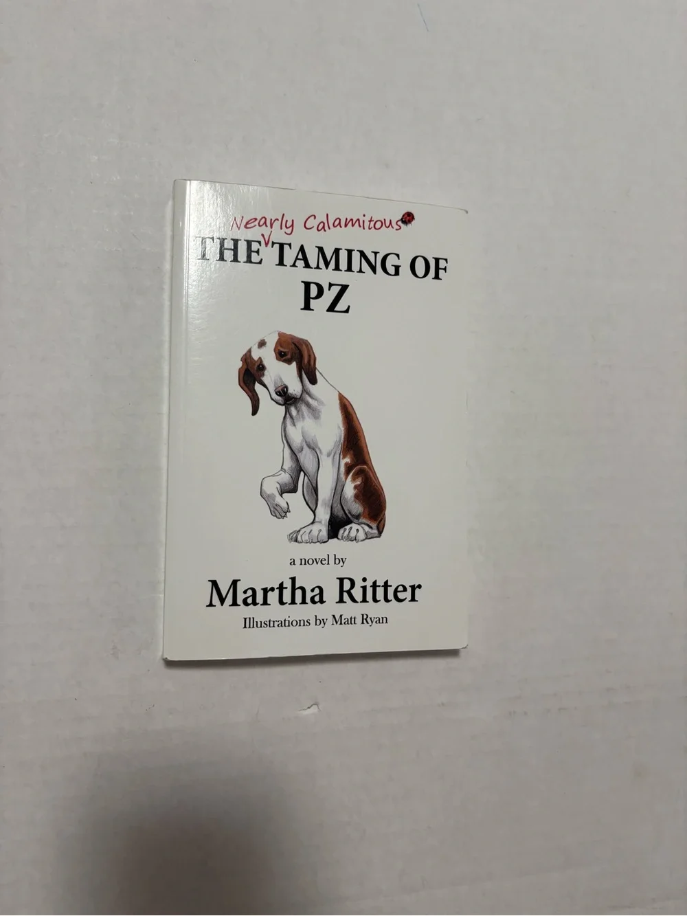 The Taming of PZ by Martha Ritter - White Cover with Brown Dog Illustration