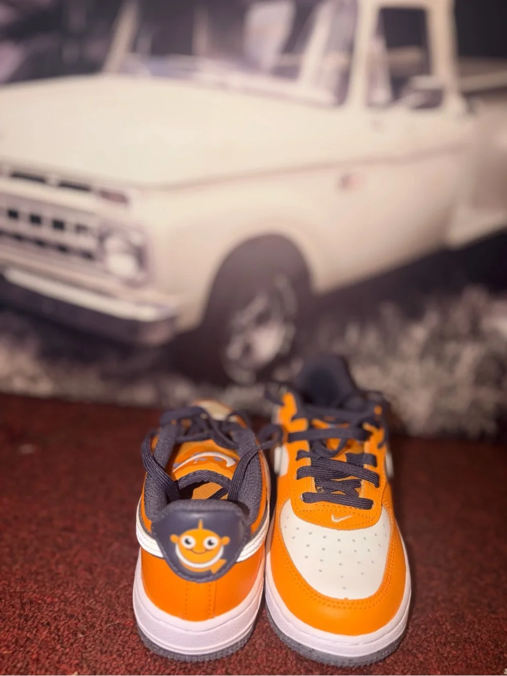 Nike Kids Orange and Gray Low-Top Sneakers with Smiley Heel