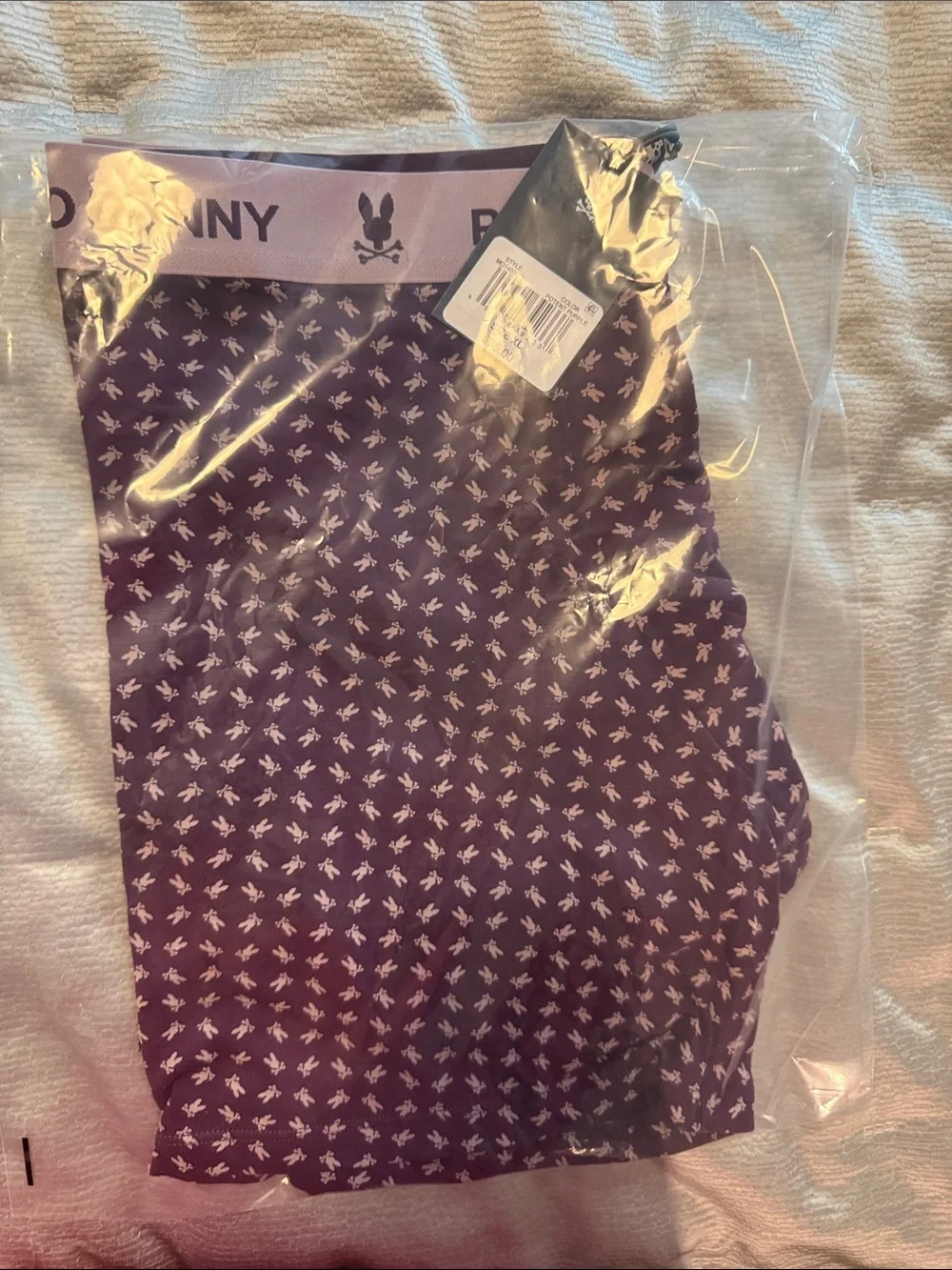 Psycho Bunny fabric over logo