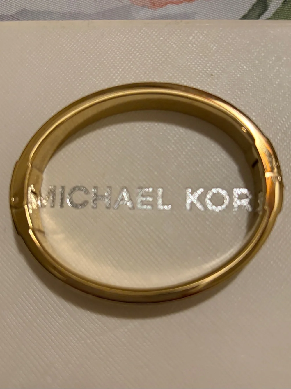 Michael Kors gold tone