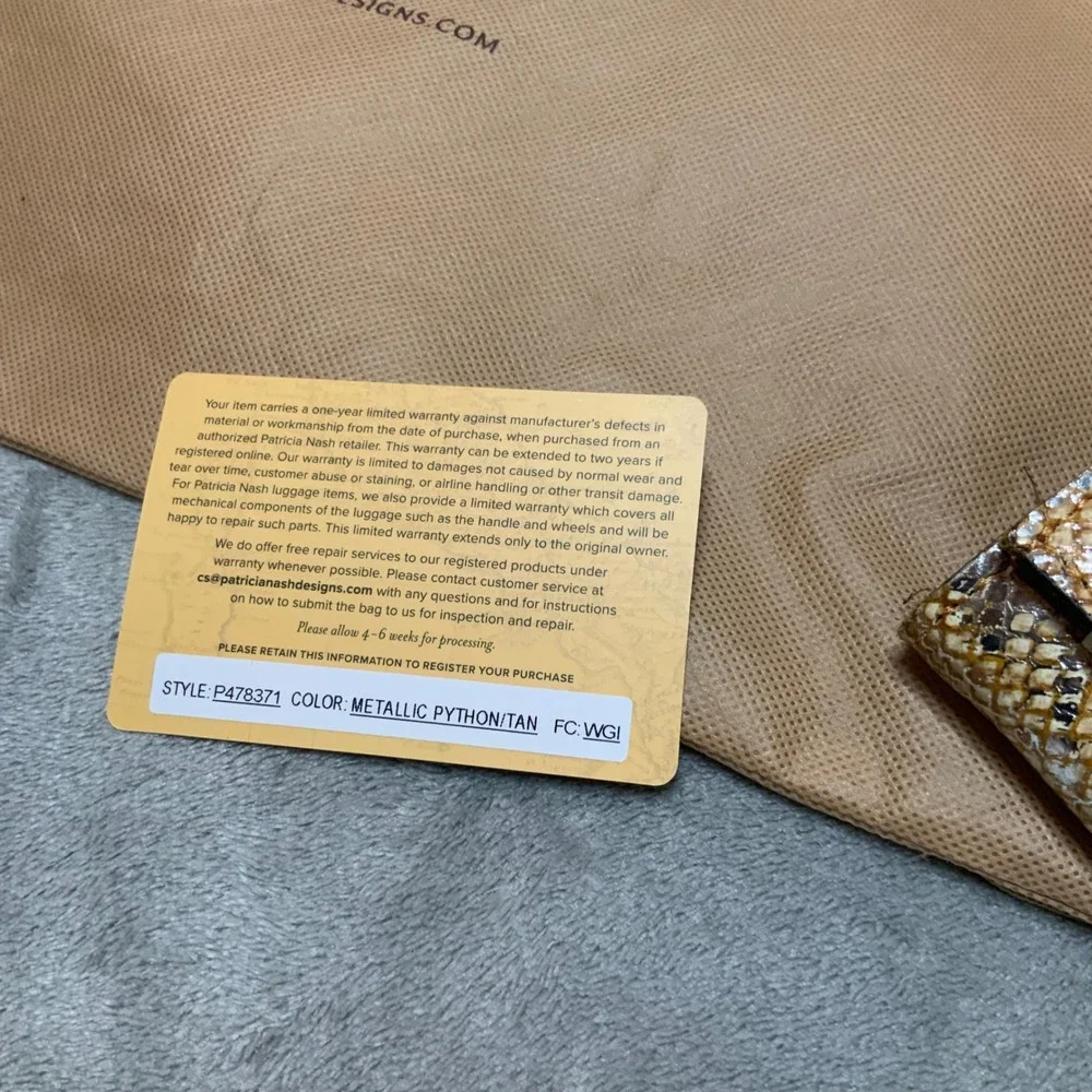 Patricia Nash trifold offers brass