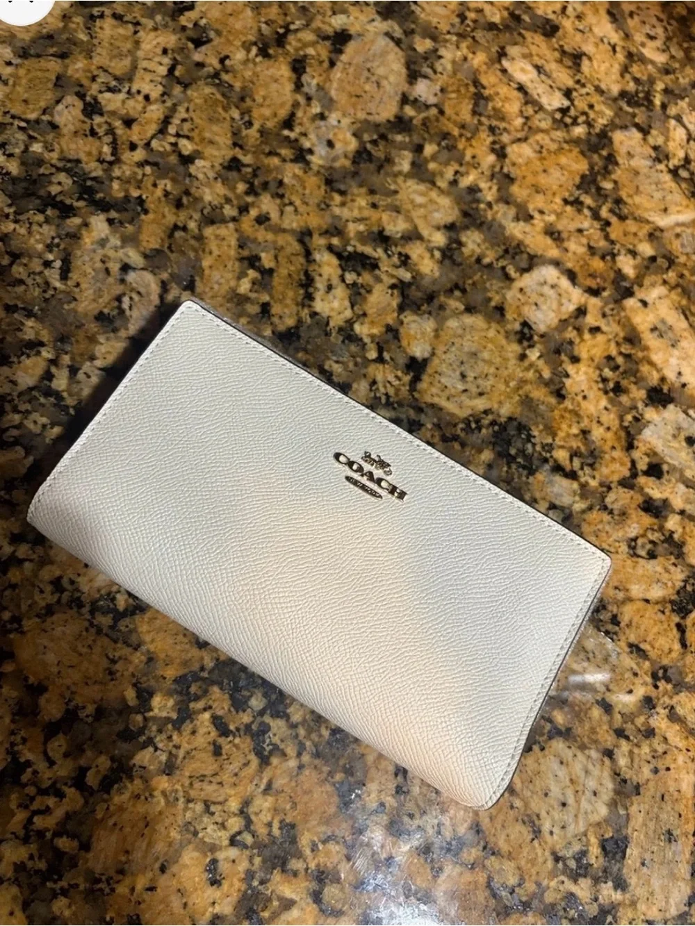 Coach retails $268