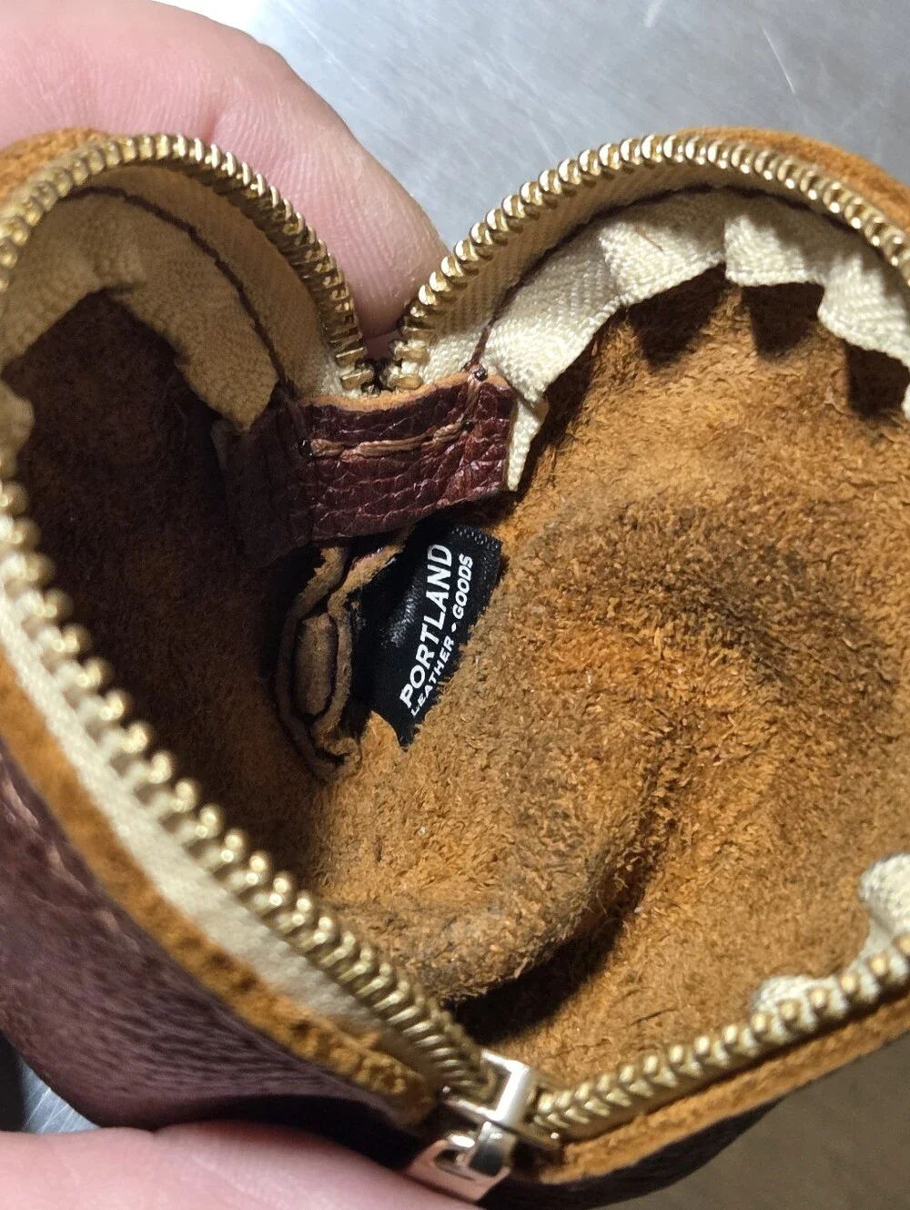 portland leather goods see guc