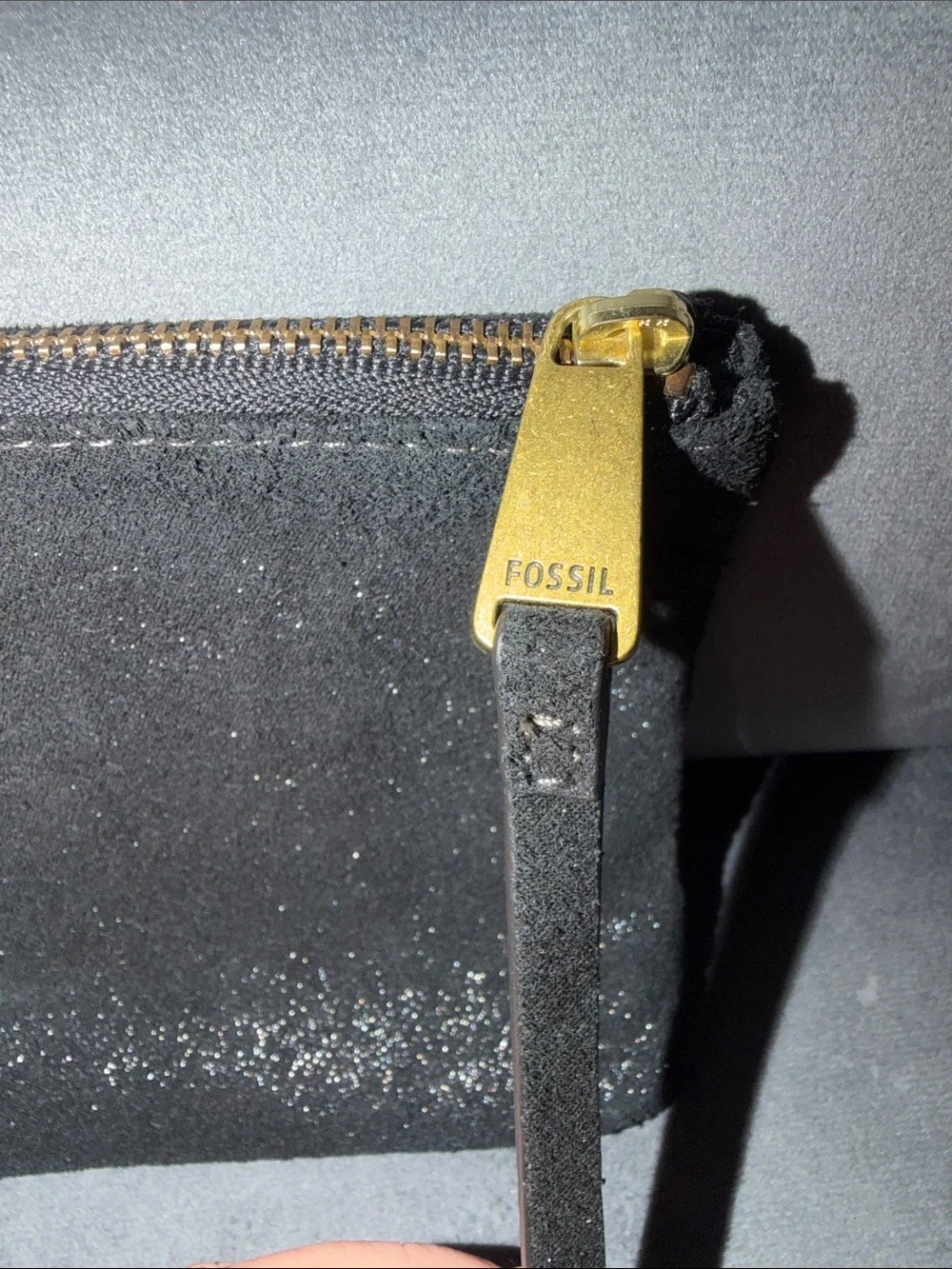 Fossil sleek zip