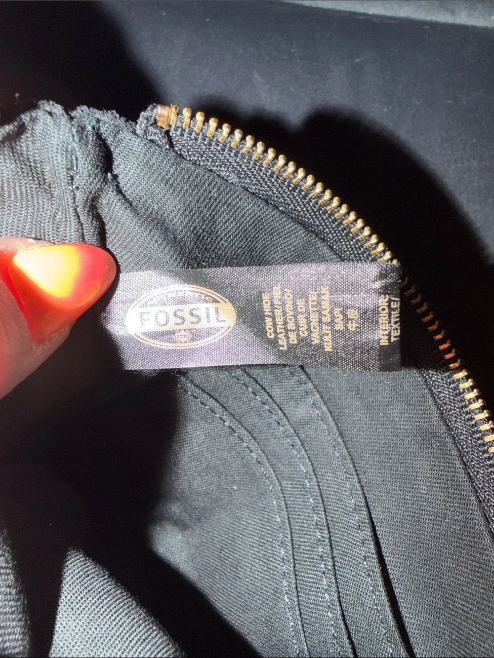 Fossil sleek zip