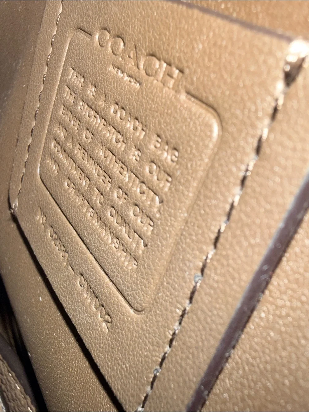 Coach features leather