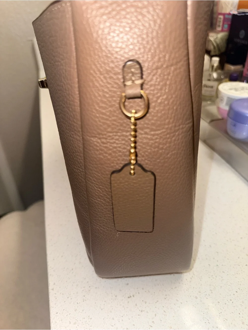 Coach features logo everyday