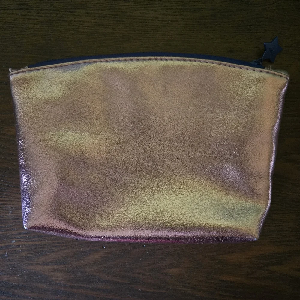 and off she went to save the world... Ipsy Metallic Rose Gold Makeup Bag