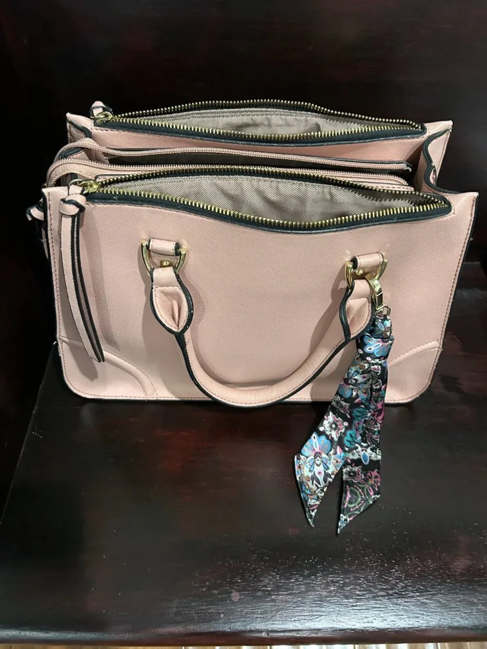 London Fog compartment included tassel