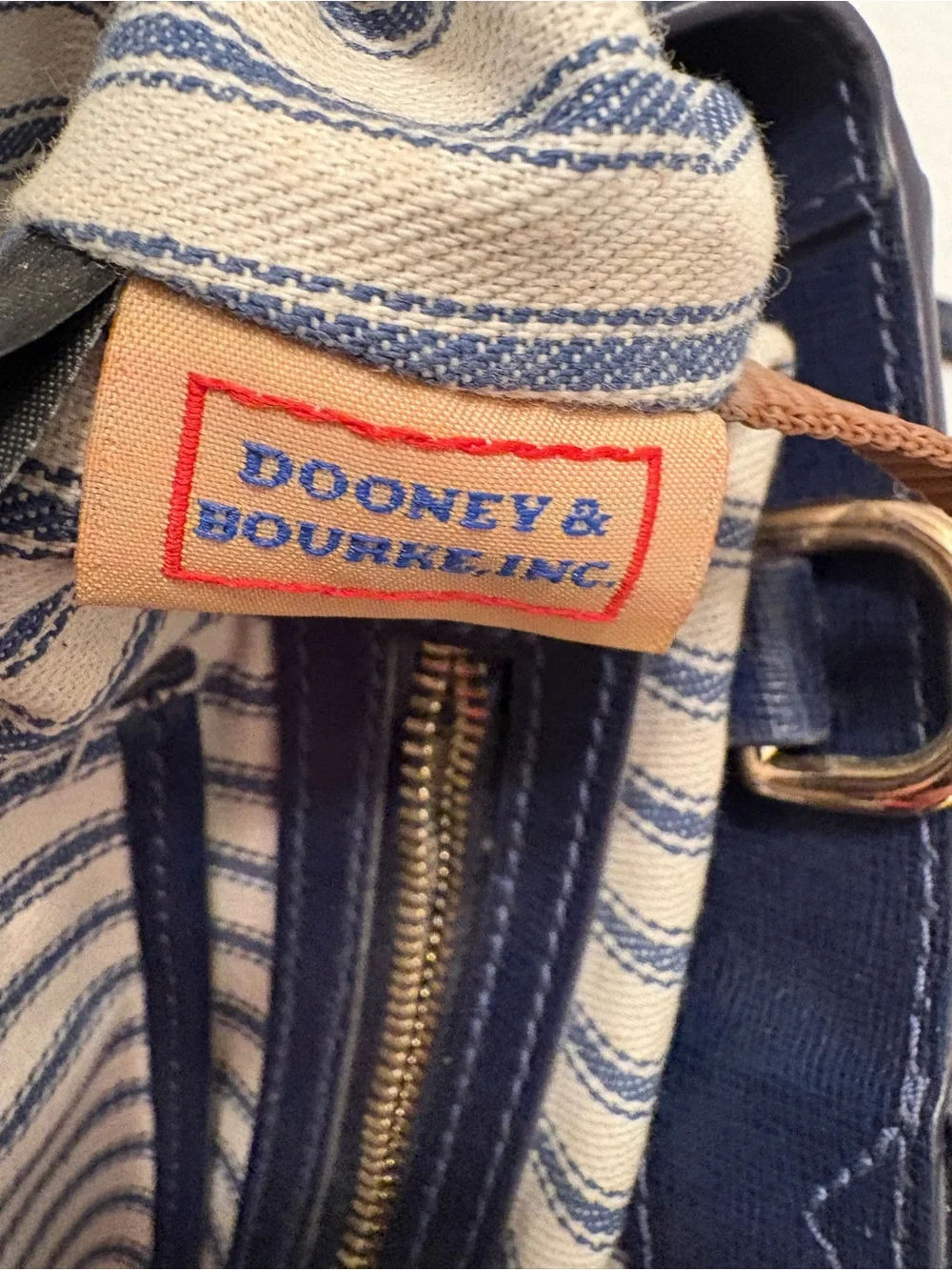 Dooney & Bourke handle phone zip