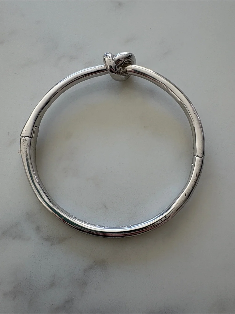 kate spade silver sailor’s knot hinged bangle bracelet - polished silver-tone