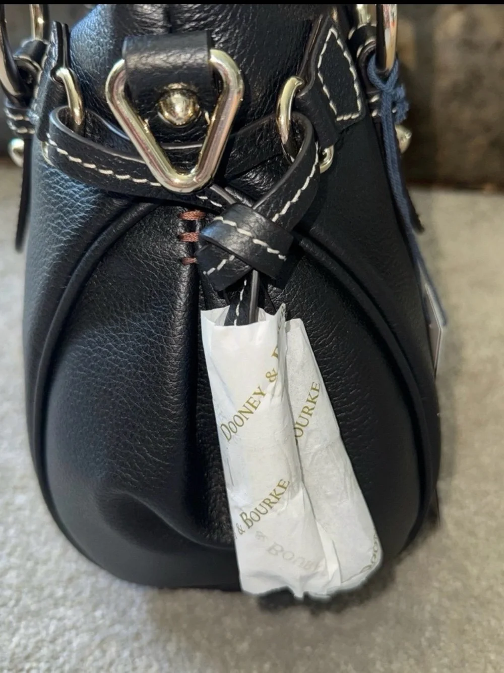 Dooney & Bourke hardware bottom