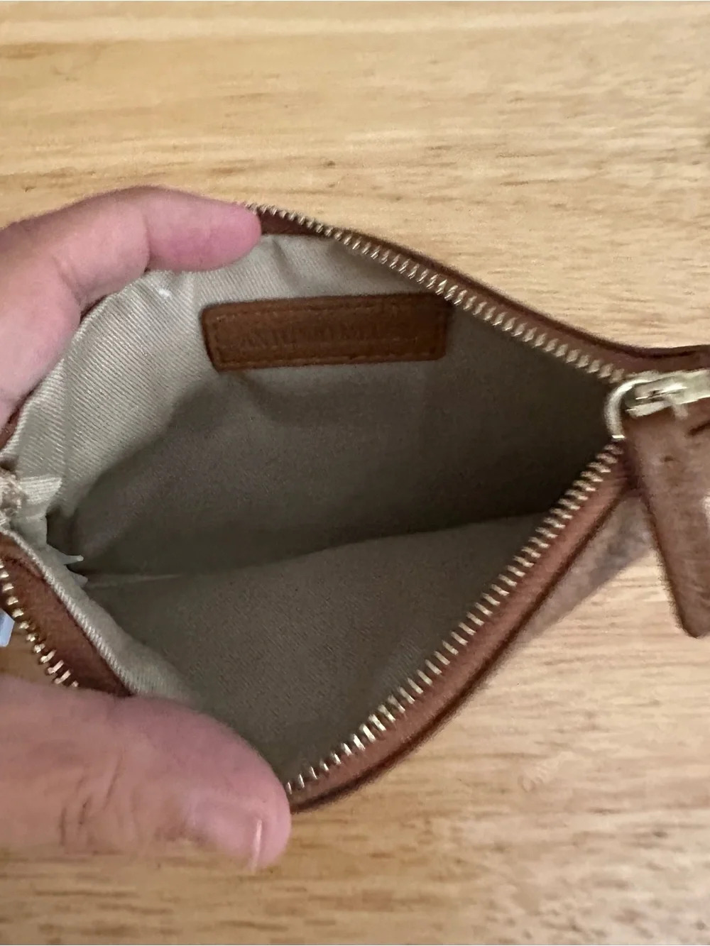 ANTONIO MELANI secures zip removable