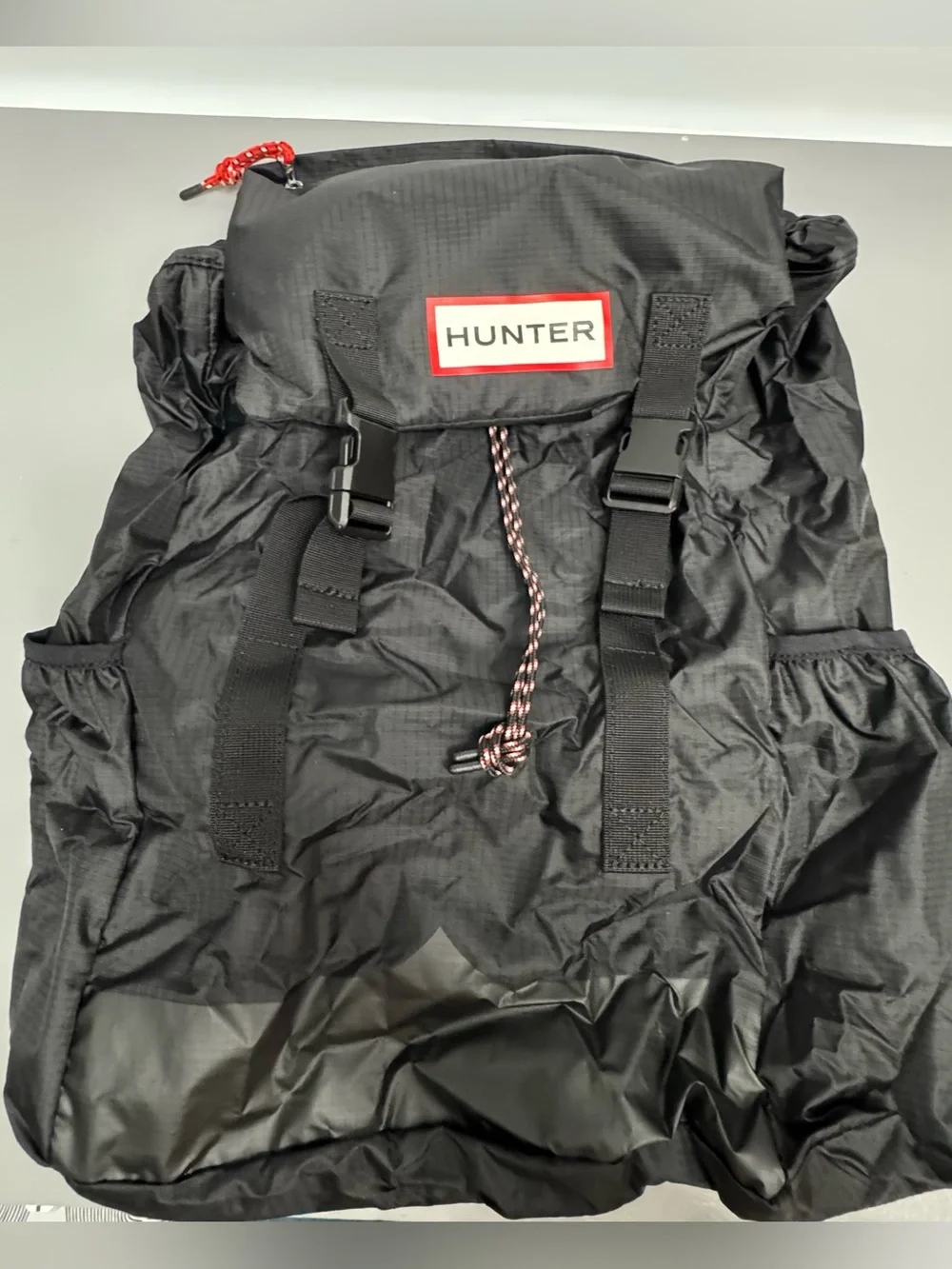 Hunter Black Backpack folds into Pouch
