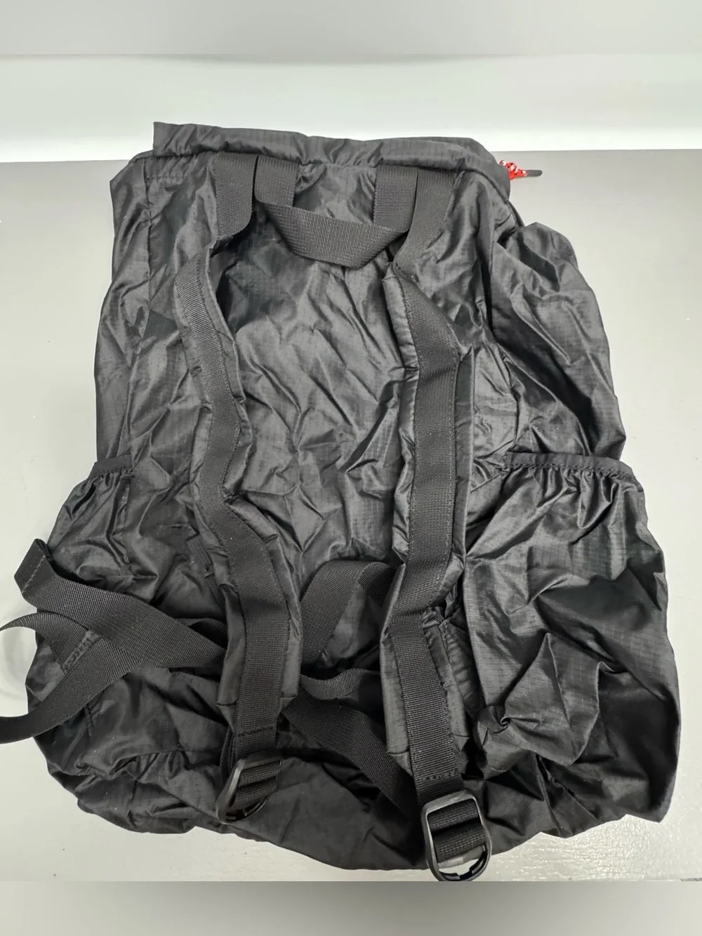 Hunter Black Backpack folds into Pouch