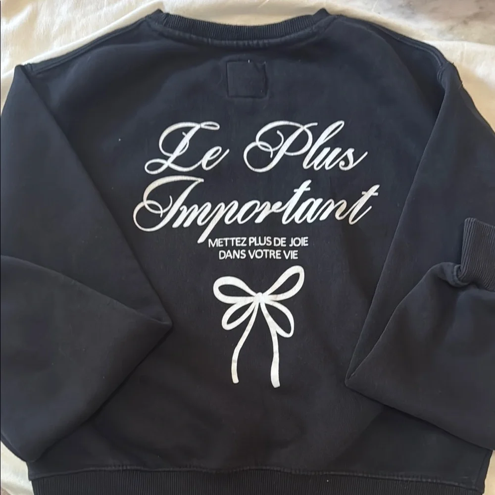 Zara Black Sweatshirt with White Bow Design