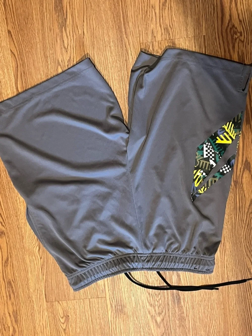 Nike Men's Slate Gray Athletic Shorts with Yellow Accent