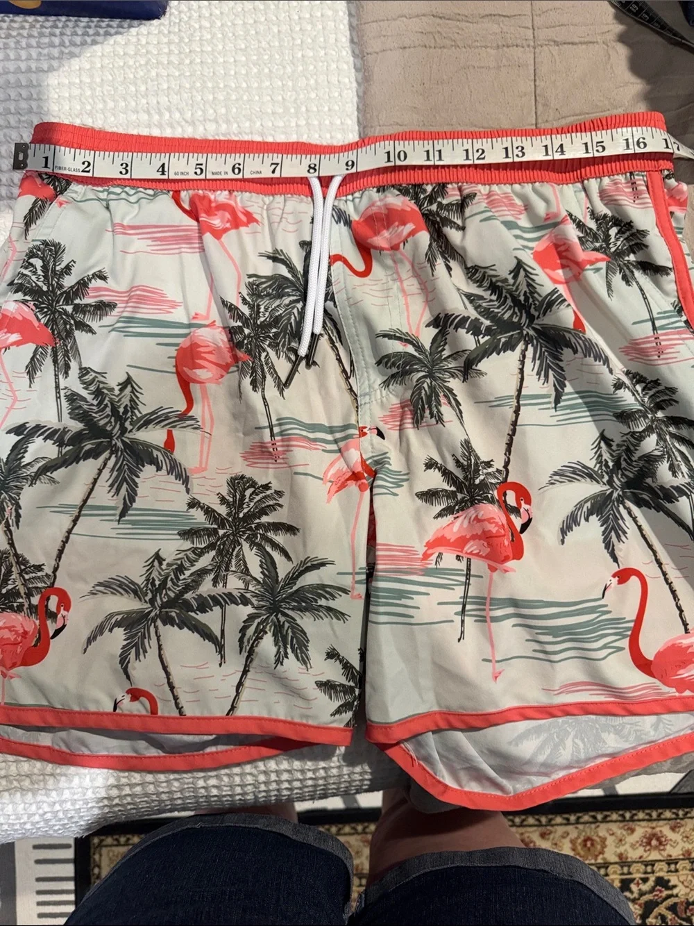 Maamgic flamingo print swim trunks feature a vintage 80s-90s style with a contra
