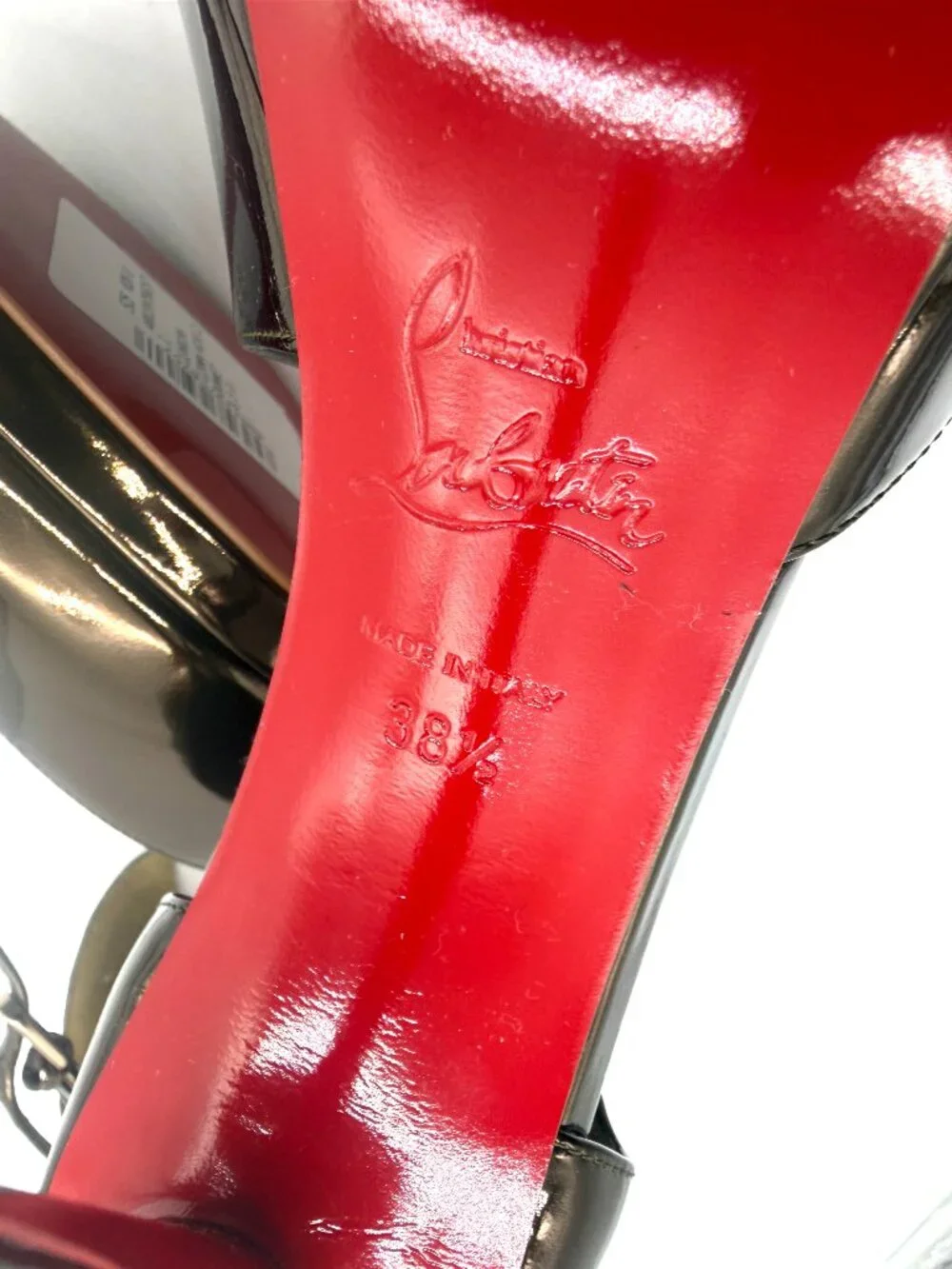 Christian Louboutin glossy brand soles