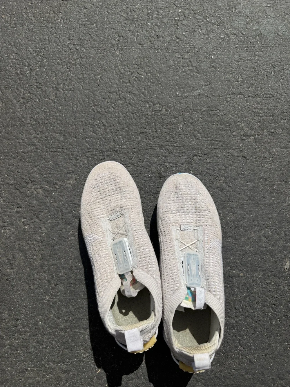 Nike Women's Light Gray Slip-On Knit Athletic Shoes