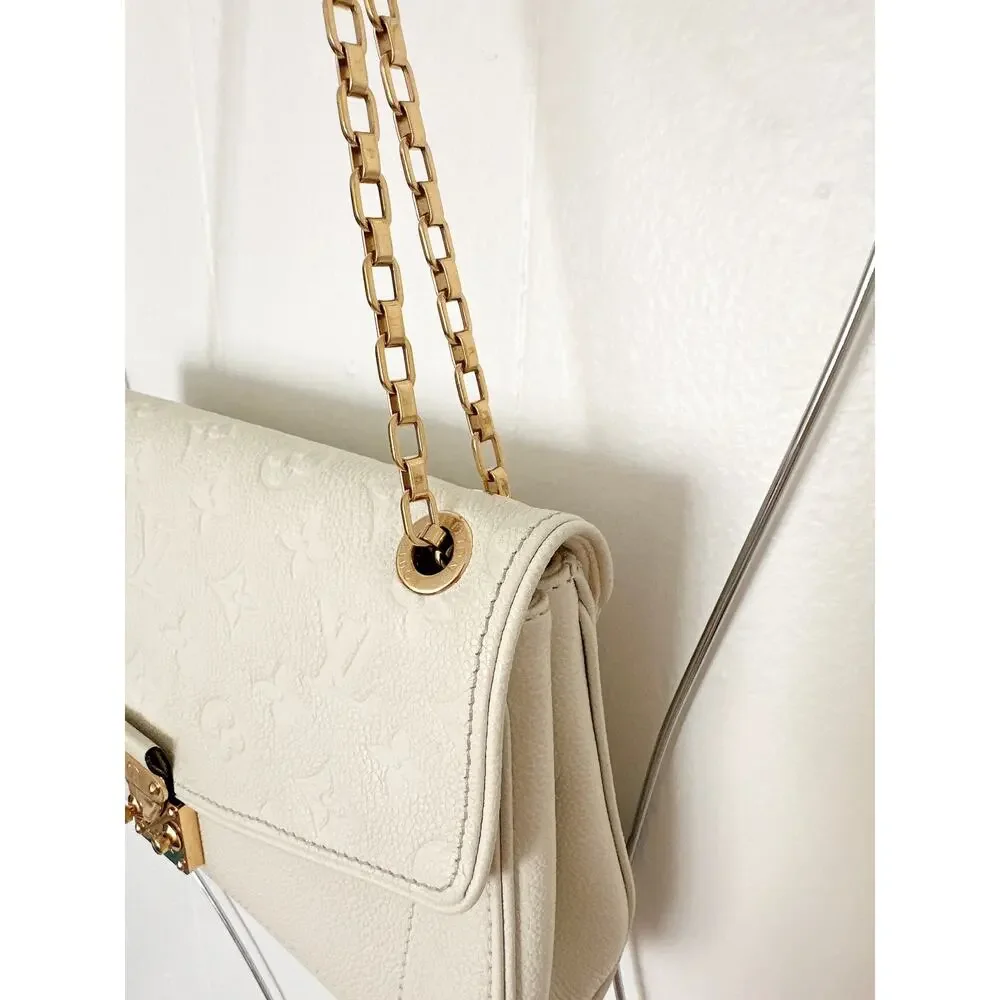 Louis Vuitton Monogram Empreinte Saint Germain PM Chain Flap Bag Dune Cream
