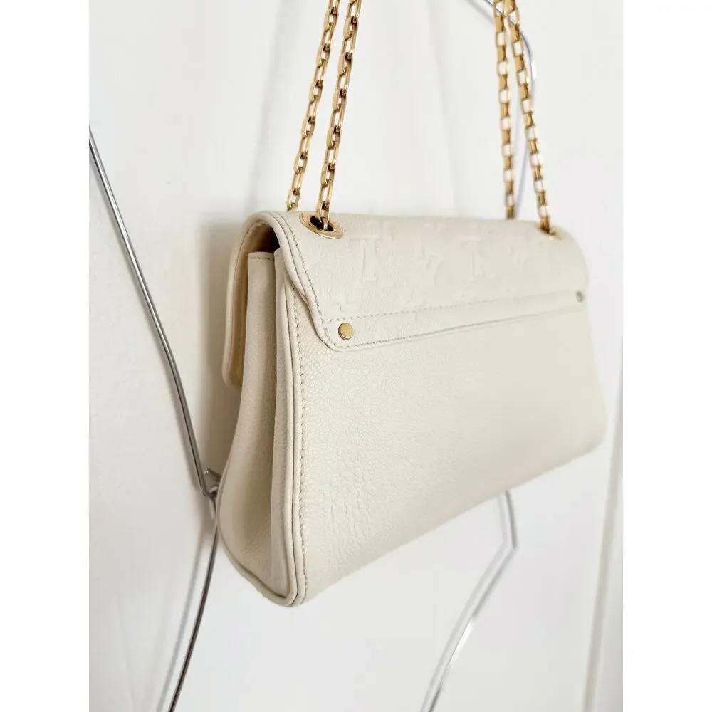 Louis Vuitton Monogram Empreinte Saint Germain PM Chain Flap Bag Dune Cream