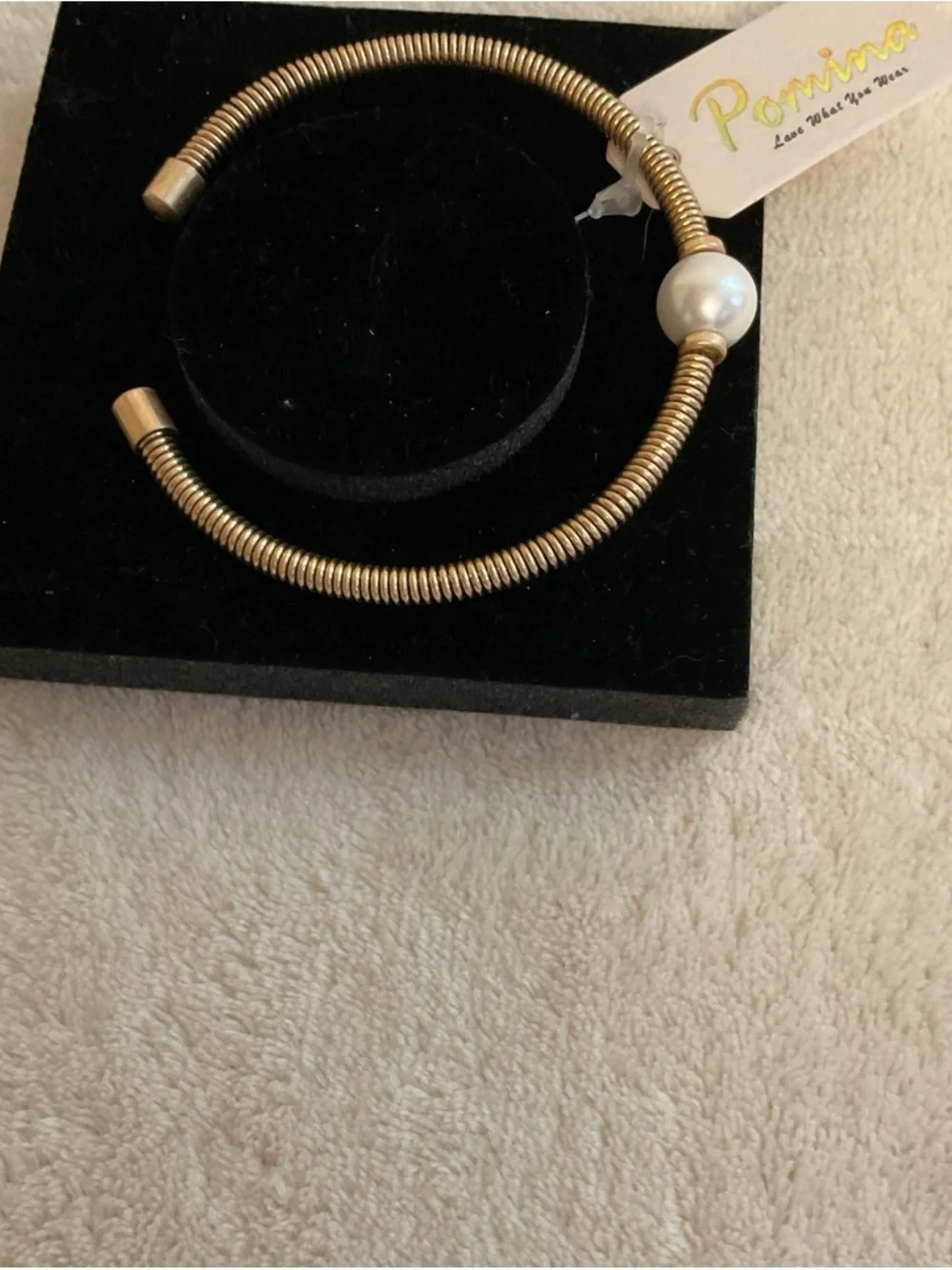 Pomina gold tone