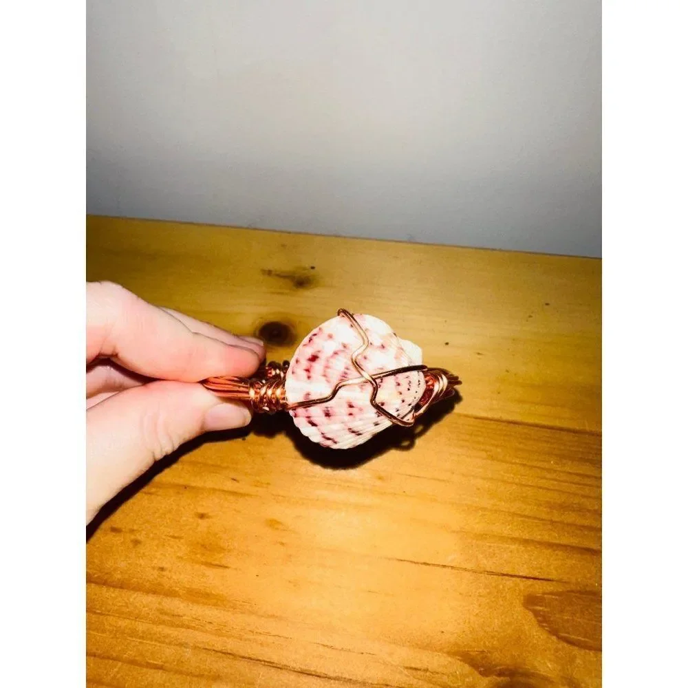Handmade wrapped seashell