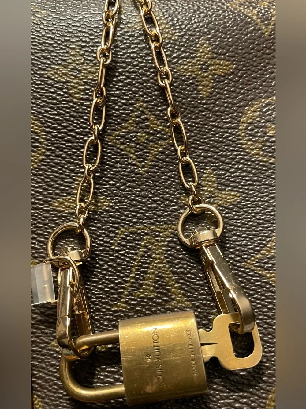 Louis Vuitton gold tone