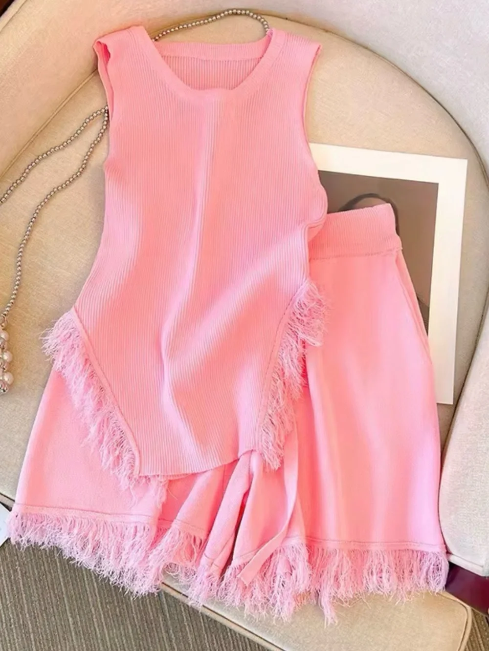 N/A sleeveless pink hem