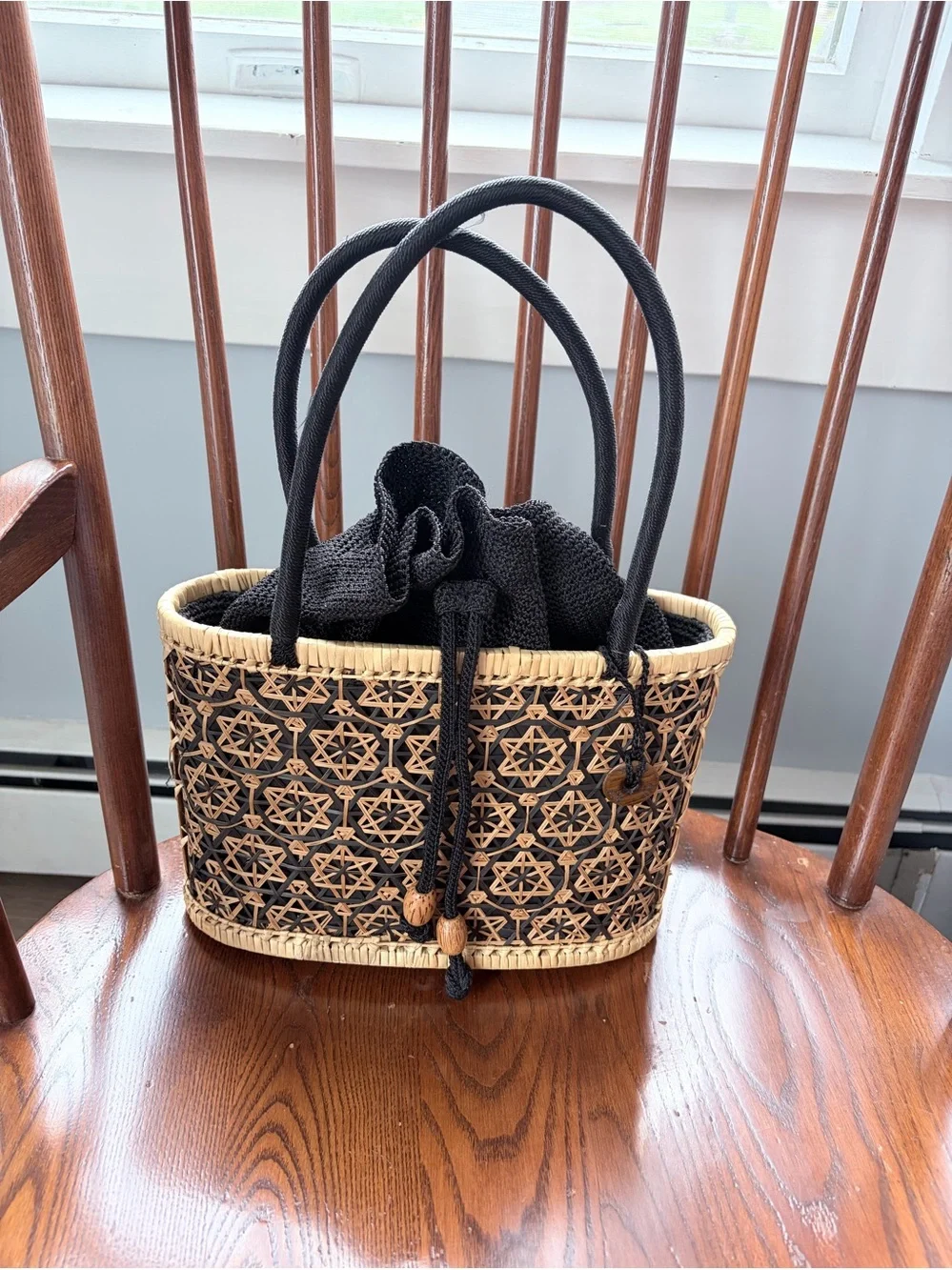 The Sak Woven Rattan Basket Drawstring Tote Purse